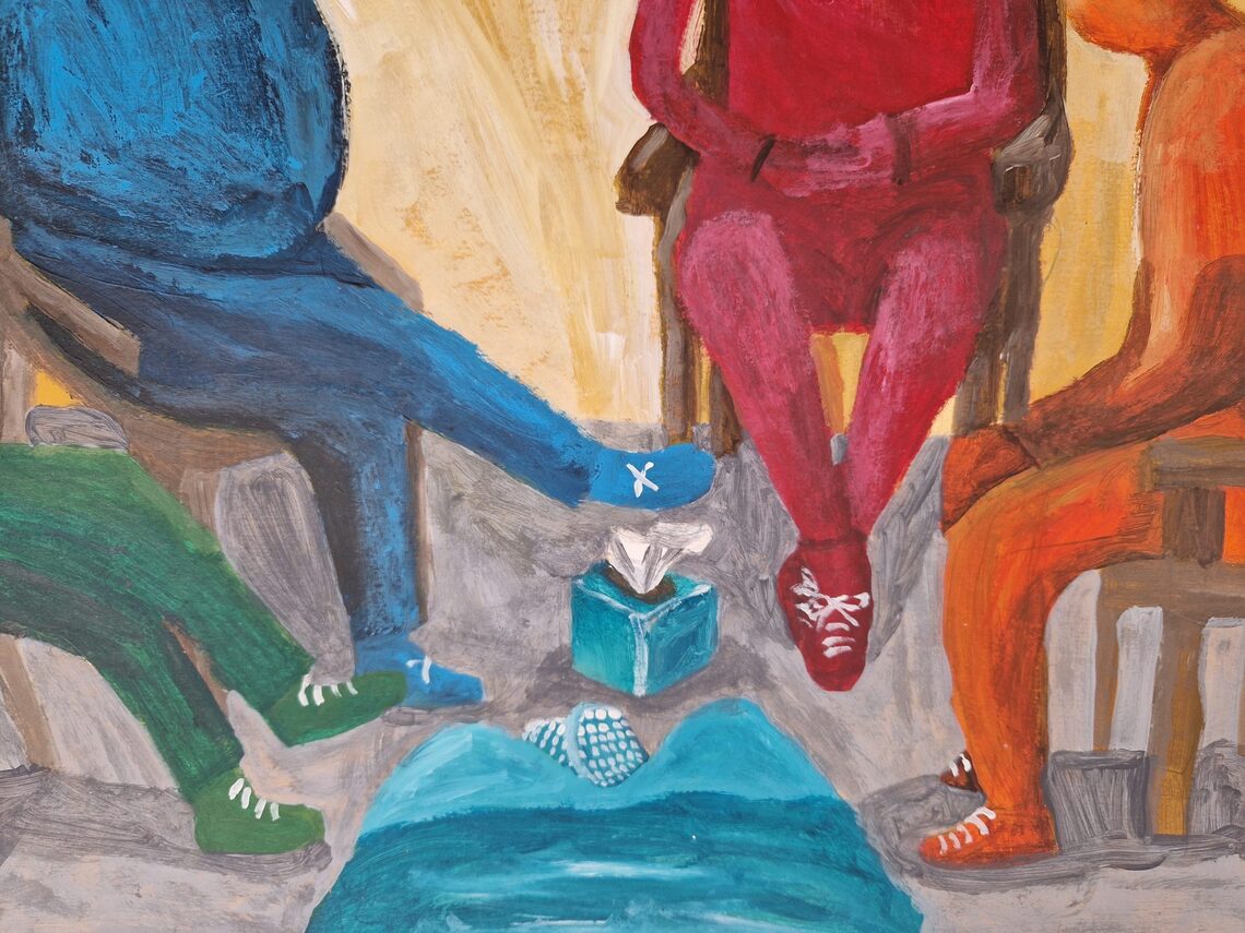 Colourful people sitting on chairs in circle
