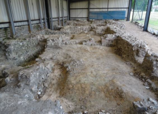 Mounds of dirt in open space, formerly Romano-British bathhouse
