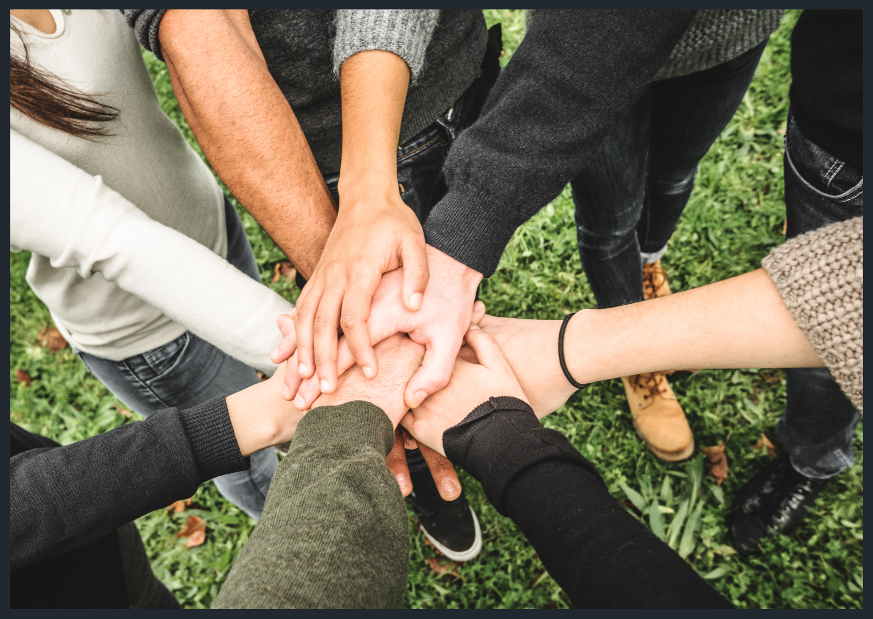 Image of volunteer hands together