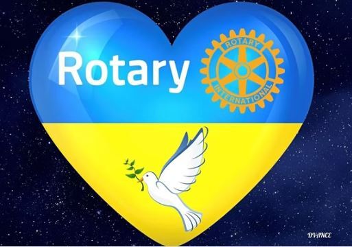 Blue and yellow heart with Rotary logo