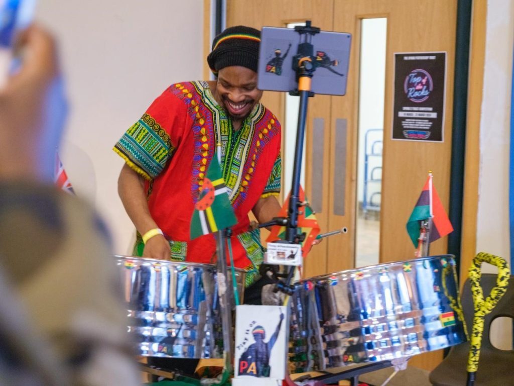 Steel Pan drummer at MBLR Women's event