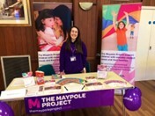 Image of Volunteer Administrator, Laura Nicholls, at information stall for The Maypole Project