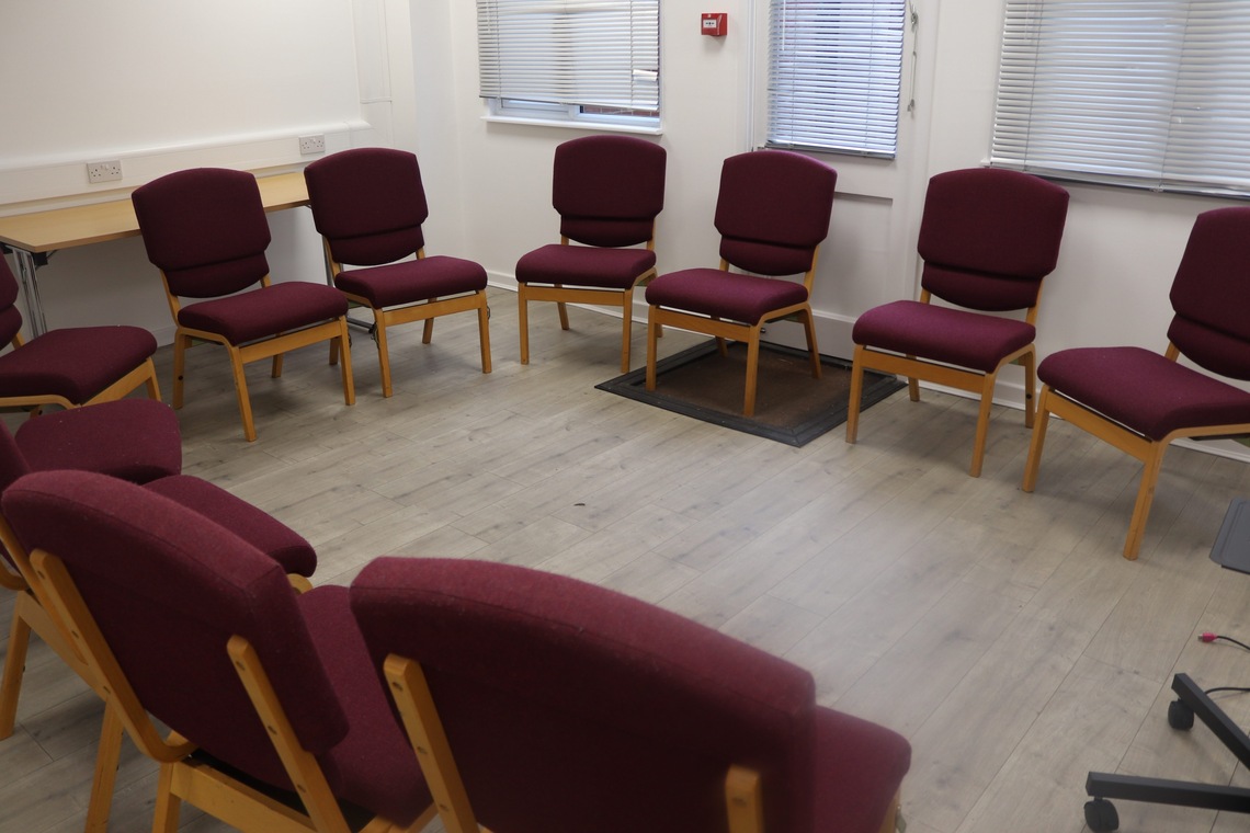 Chairs in a circle in room